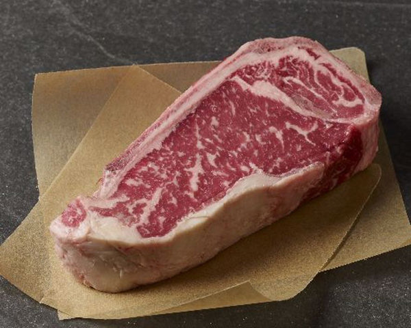 NATURAL PRIME DRY-AGED BONE-IN STRIP STEAK